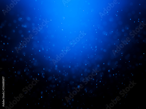 Blue bokeh on a dark background. Blur the background and wallpaper