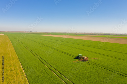 Agriculture Tractor Working in Field