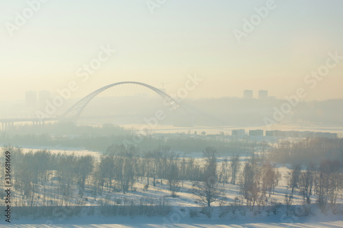 Bugrinsky bridge in winter foggy morning 