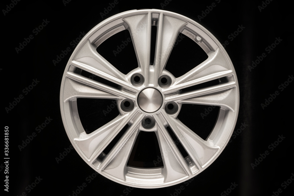 new aluminum alloy wheel, silver color on a black background