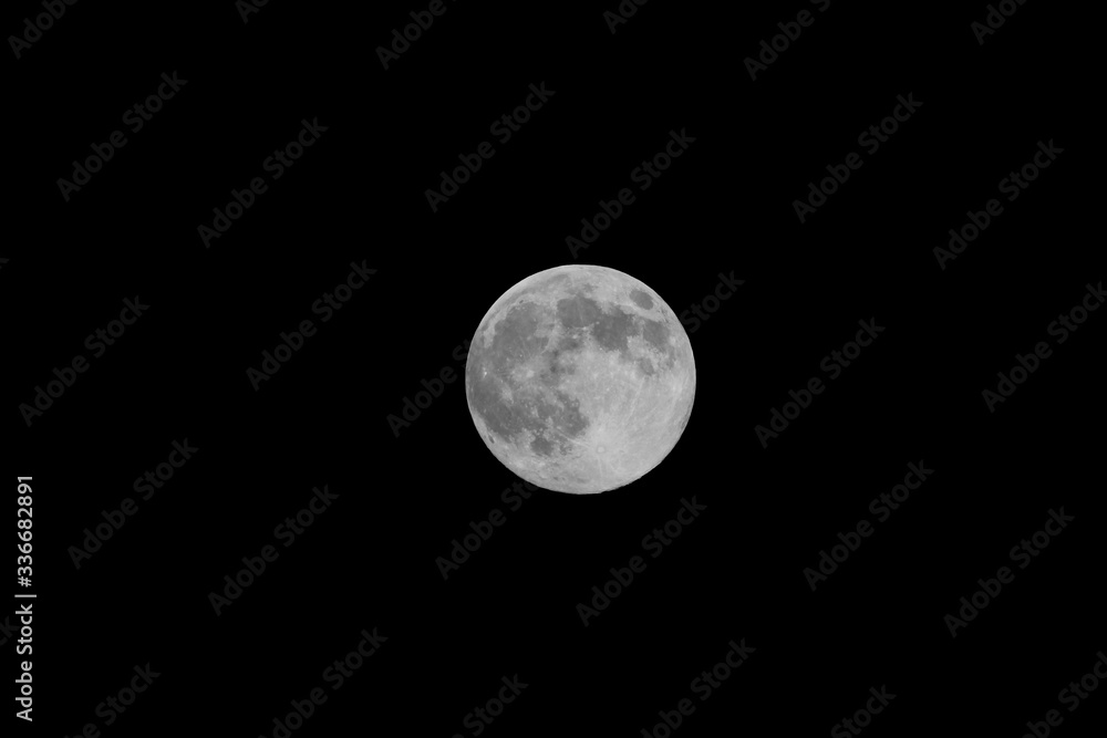 Pink Supermoon full moon 8th April 2020 in Sheffield. It occurs when the full moon is at its closest point to Earth in its monthly orbit. Full moon. A huge moon. Pink Supermoon full moon 8th April 2020 in Sheffield. It occurs when the full moon is at its closest point to Earth in its monthly orbit. Full moon. A huge moon.