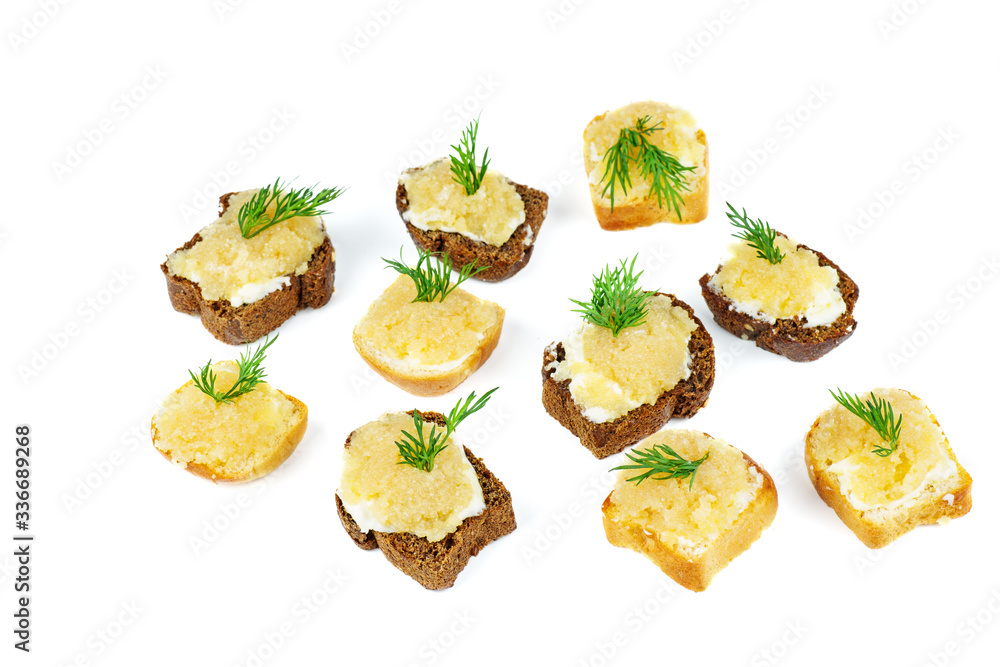 Bread pieces with delicious cod caviar on white background Bread pieces with delicious cod caviar on white background