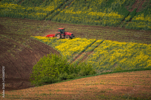 Tractor in the moravian field at spring near Karlin  Chech Republic