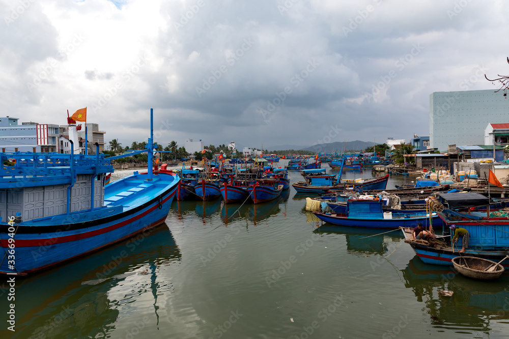 fishing boats in the harbor in Vietnam