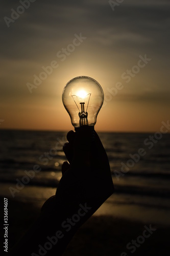 
Light bulb as a source of light near the sea