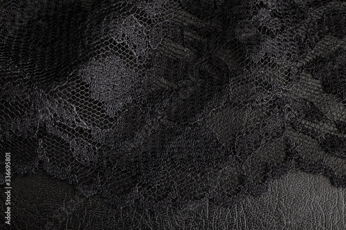 Black lace on black background