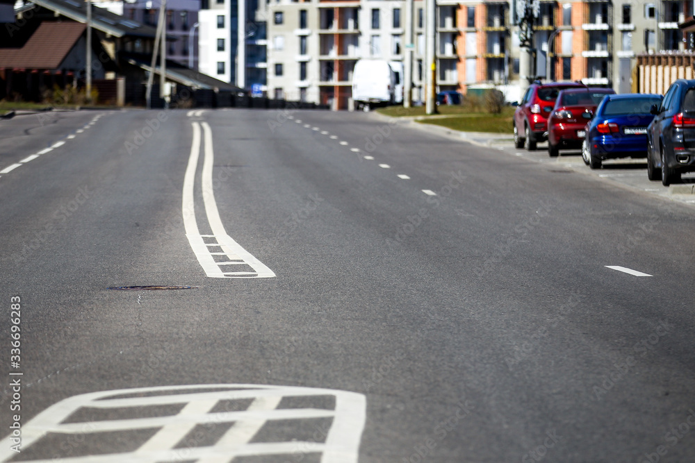 Obraz premium Road marking an empty street during a virus