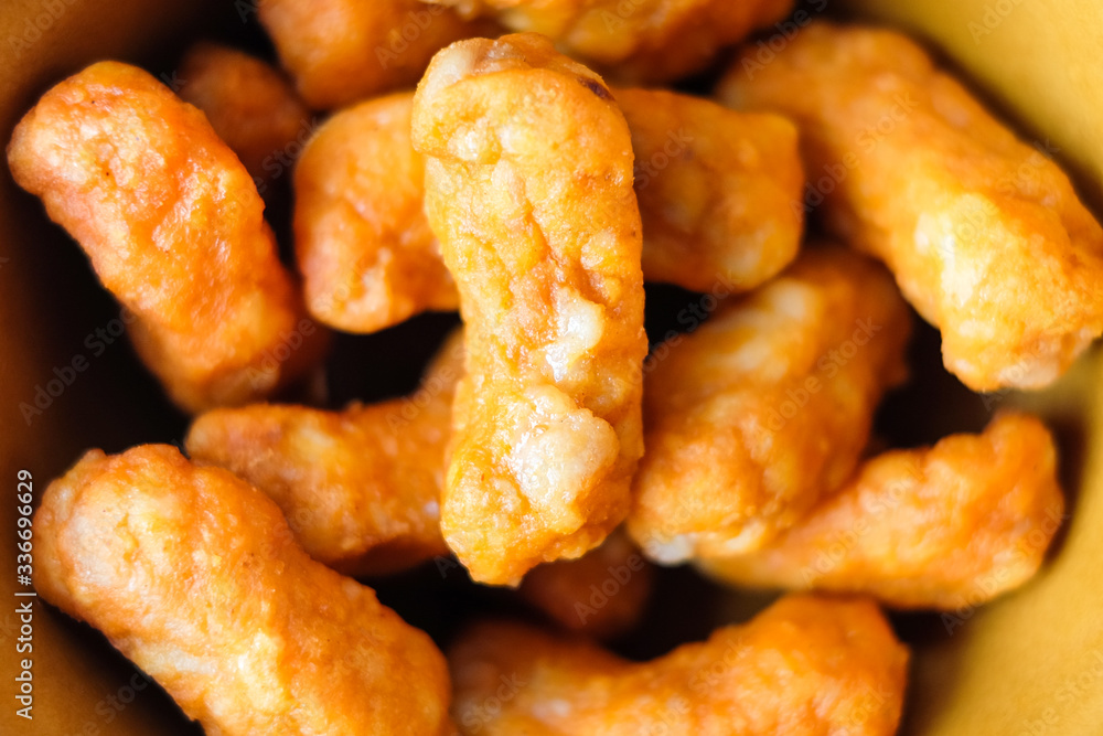 Closeup seasoned chili chicken snack in the ceramic bowl - food concept. Closeup seasoned chili chicken snack in the ceramic bowl - food concept.