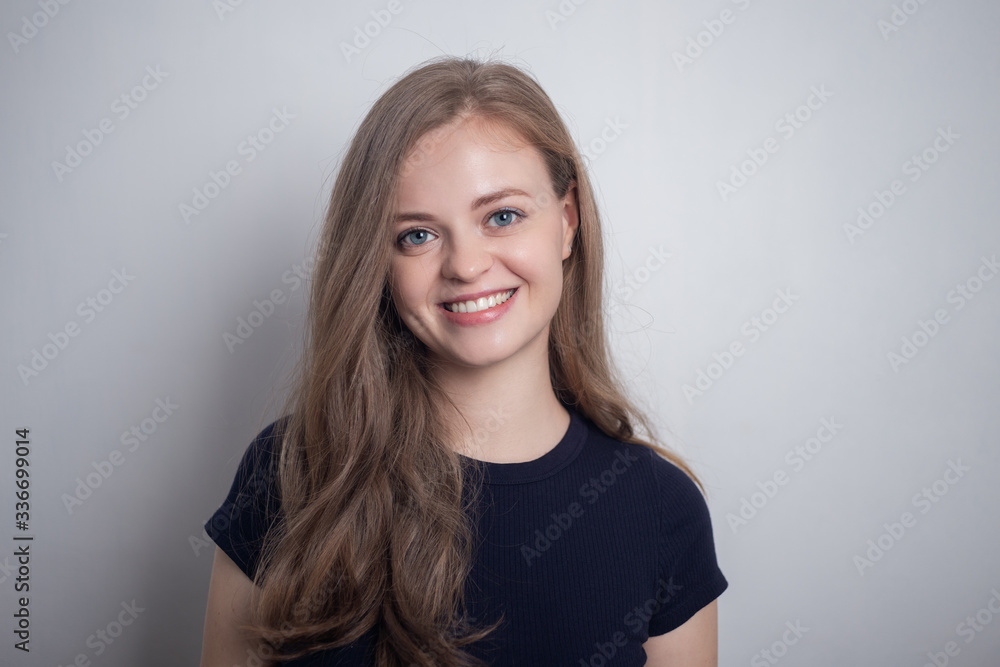 Smiling young caucasian girl woman, looking happy and positive Smiling young caucasian girl woman, looking happy and positive