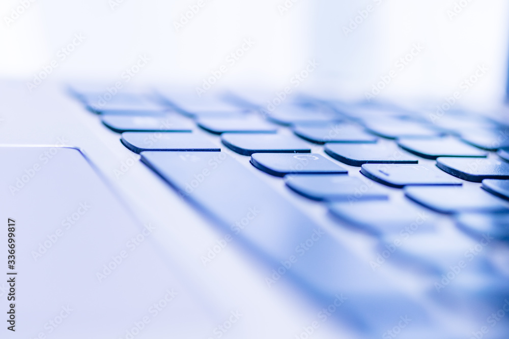 Blue tinged laptop keyboard