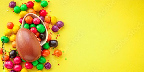 chocolate egg and candy easter decor  menu concept background. top view. copy space for text
