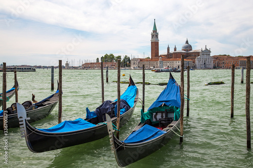 Empty gondolas on the canal in Venice, Italy