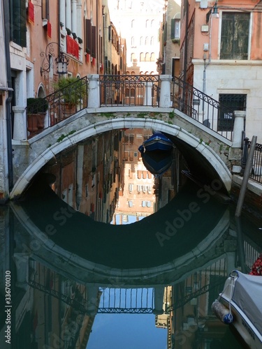 Arched bridge over a canal in Venice Italy