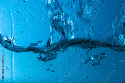 Fotografie water splash with reflection, isolated on white background.