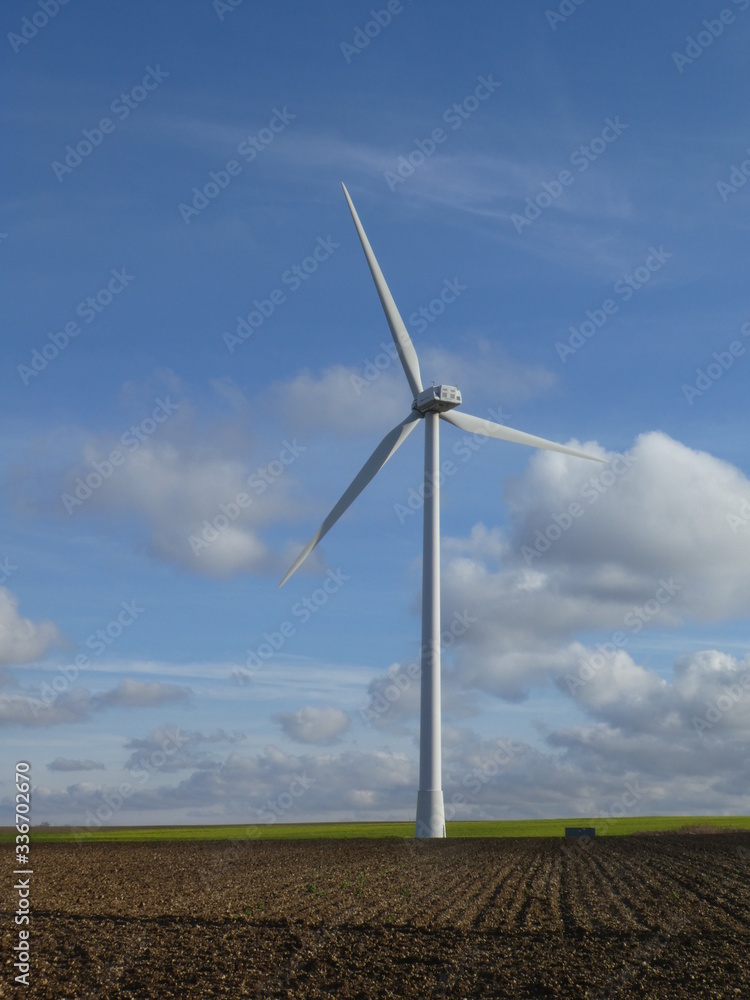 Wind turbine in a field in France, Europe Wind turbine in a field in France, Europe