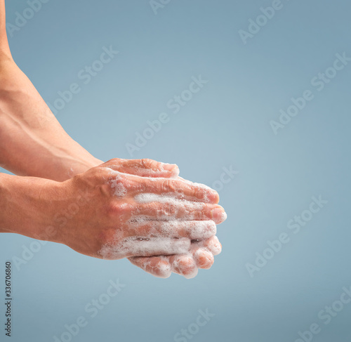 Man washing hands with soap