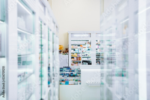 Transparent glass showcase locating in dra big drugstore photo