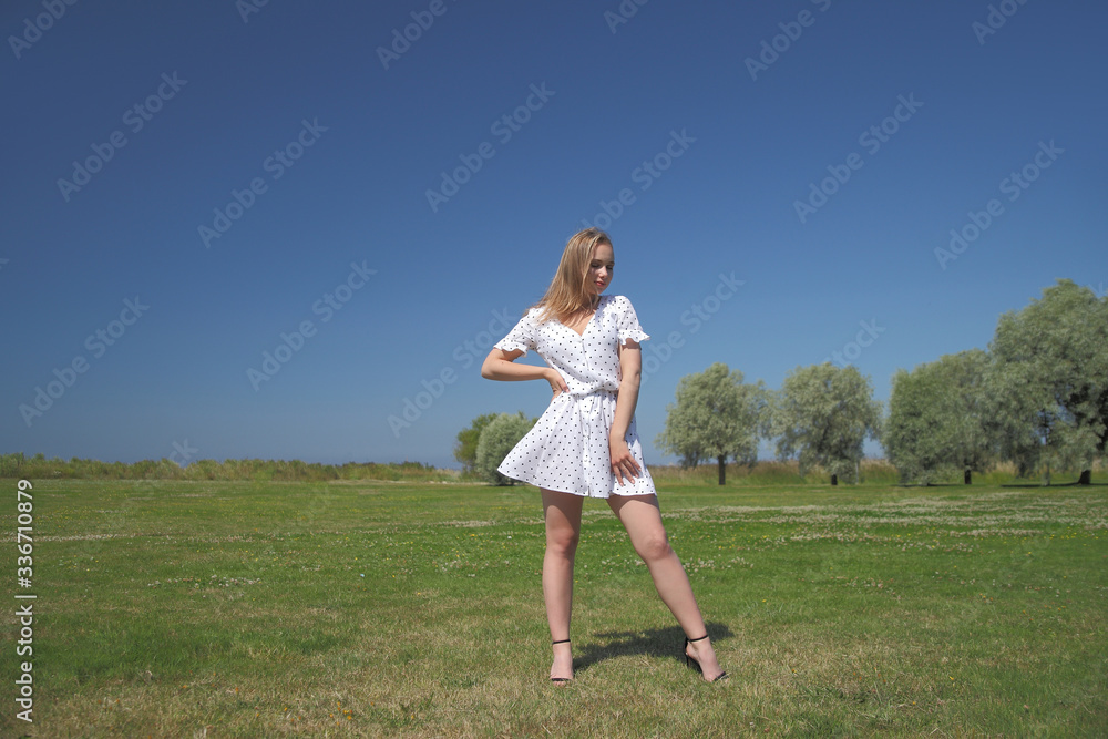 Beautiful woman enjoying summer outdoors Beautiful woman enjoying summer outdoors