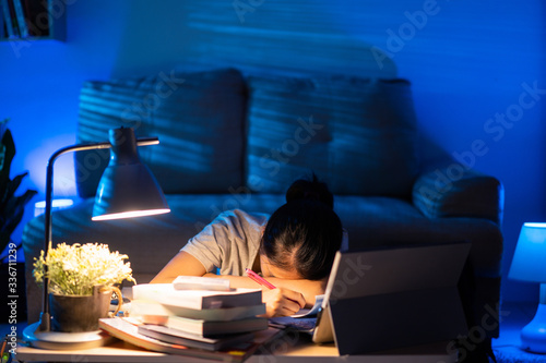 Фототапет Asian women tired from working at home She felt sleepy