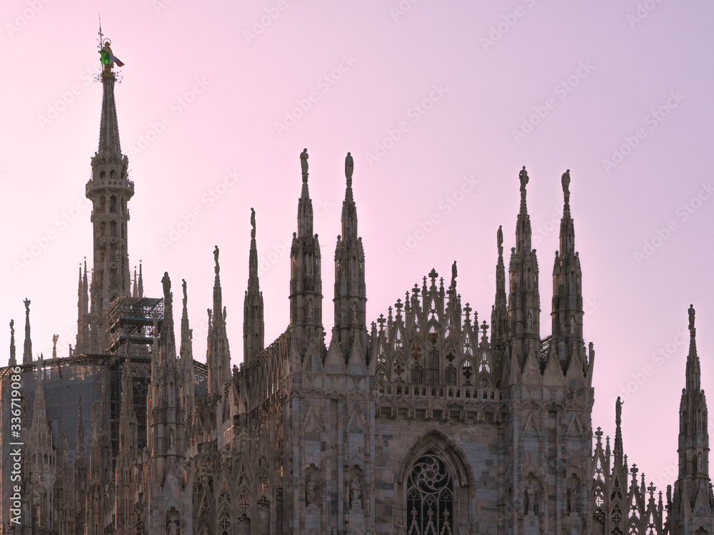 Lavender light of the dawn over the Cathedral's spiers. Milan - Italy