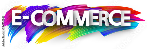Big e-commerce paper sign over brush strokes background.