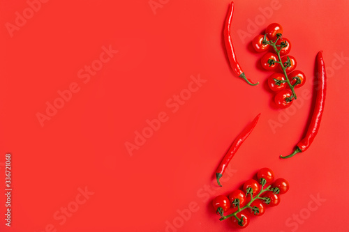 peppers and tomato  red background © Стефания Пипченко