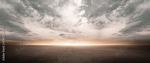 Photos Dark Concrete Floor Background with Scenic Night Sky Horizon and Dramatic Clouds