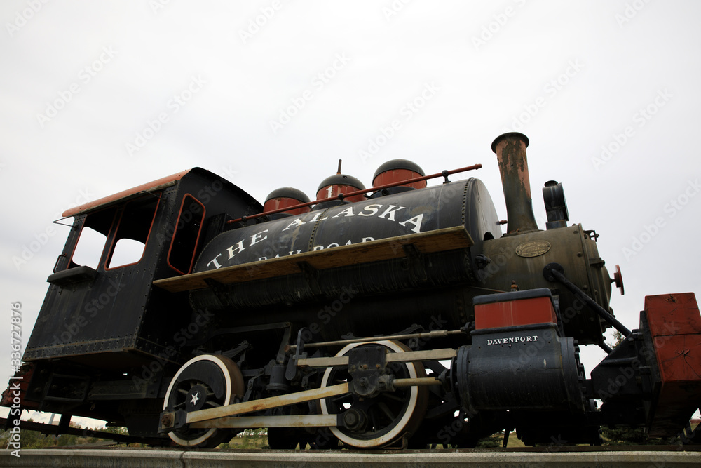 Naklejka premium Anchorage, Alaska / USA - August 08, 2019: An old locomotive in Anchorage, Anchorage, Alaska, USA