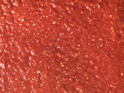 Rustic tomato sauce, macro photography, top view. © easyasaofficial