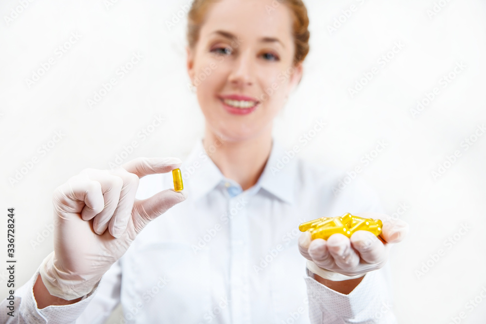 picture of doctor hand showing capsule picture of doctor hand showing capsule