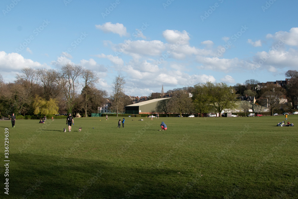 Fototapeta premium Social distancing in open park area in UK