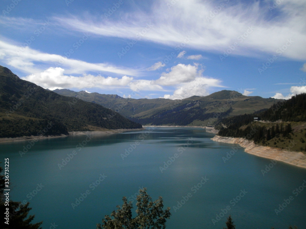 View of the lake Roselend, which is mainly a reservoir in the French alpine mountains. View of the lake Roselend, which is mainly a reservoir in the French alpine mountains.