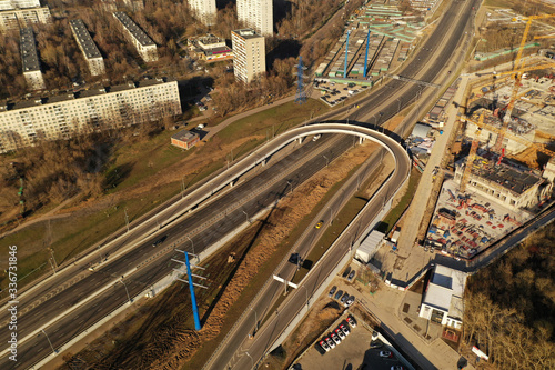 industrial views with motorways and houses filmed from a drone © константин константи
