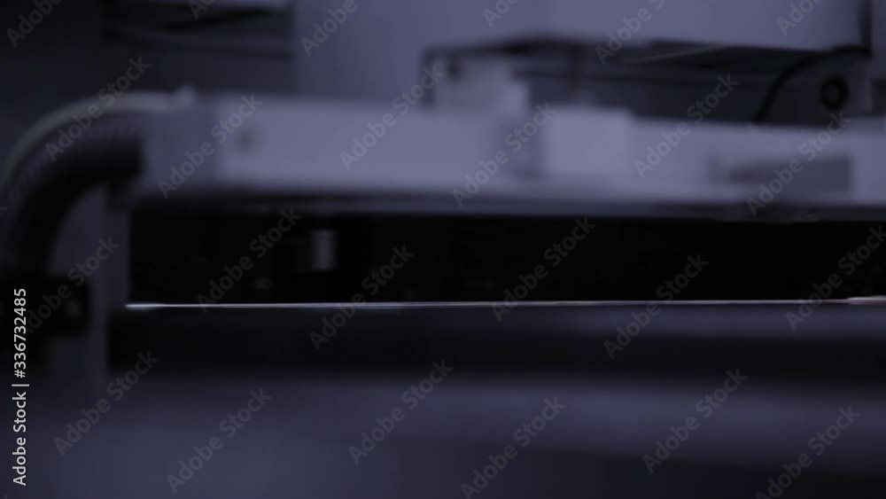 Detail shot of a digital printer in operation Detail shot of a digital printer in operation