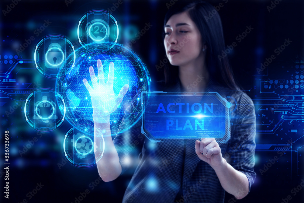 Business, Technology, Internet and network concept. Young businessman working on a virtual screen of the future and sees the inscription: Action plan Business, Technology, Internet and network concept. Young businessman working on a virtual screen of the future and sees the inscription: Action plan