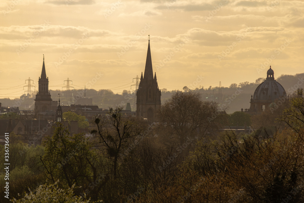 Oxford at sunset with clear skies and greenery