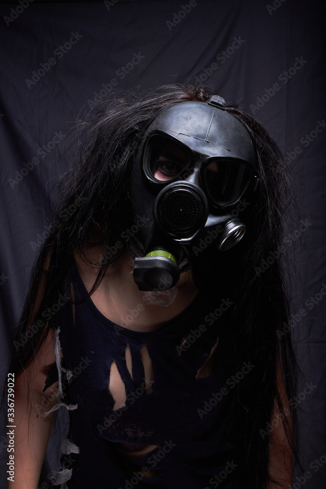 Girl in a gas mask, pandemic virus covid2019 Girl in a gas mask, pandemic virus covid2019