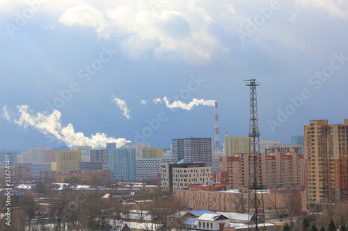 Pipes in city pollution of air with smoke ecology problem