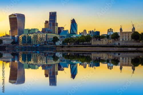 London cityscape at sunset with reflection from river Thames
