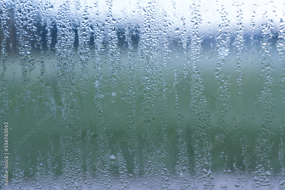 Blurred natural water drop window textured glass . Blurred natural water drop window textured glass .