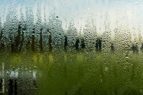 Blurred natural water drop window textured glass .