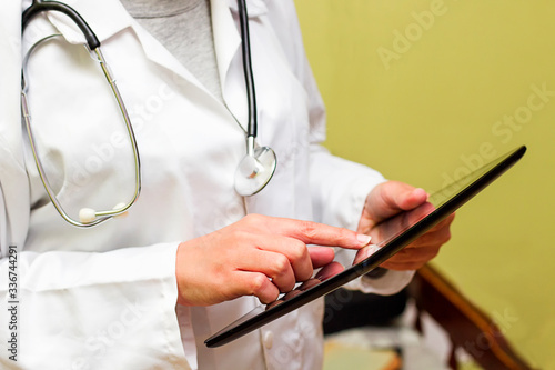 Doctor with tablet computer