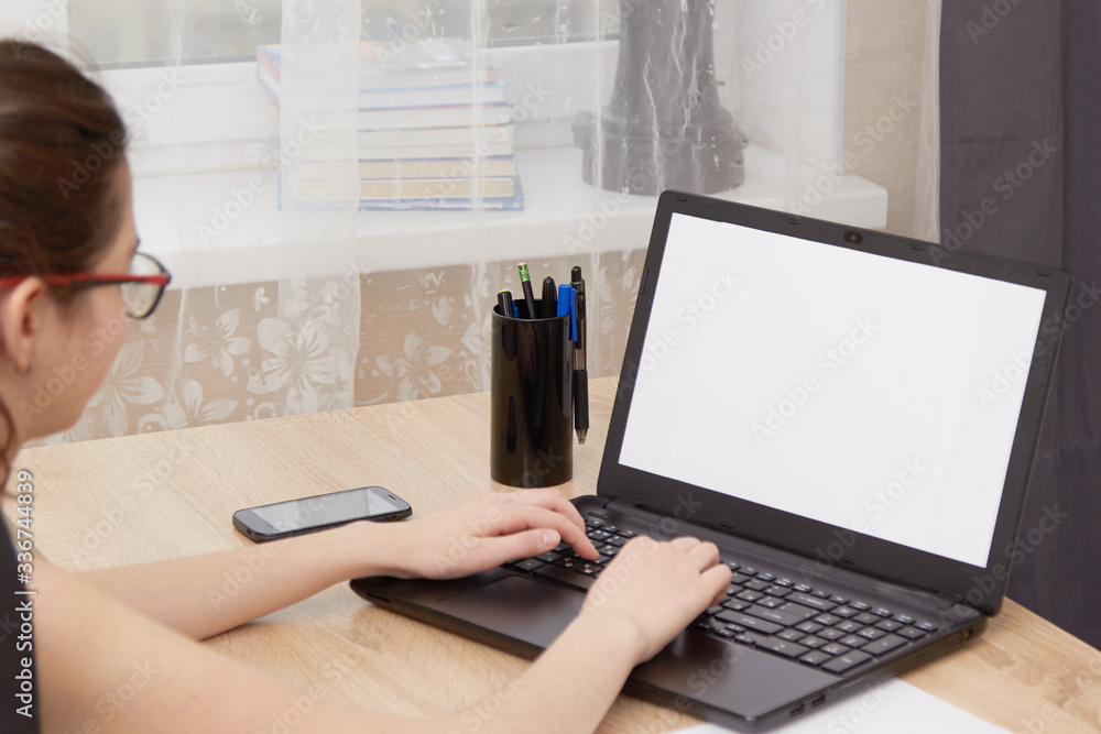 The girl is engaged in online education The girl is engaged in online education