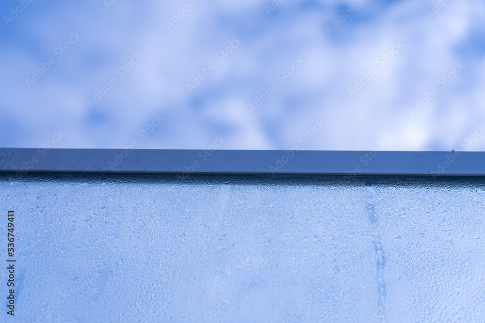 Blurred natural water drop window textured glass . Blurred natural water drop window textured glass .
