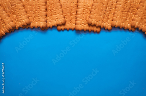 composition biscuits on a blue background lay flat top view photo