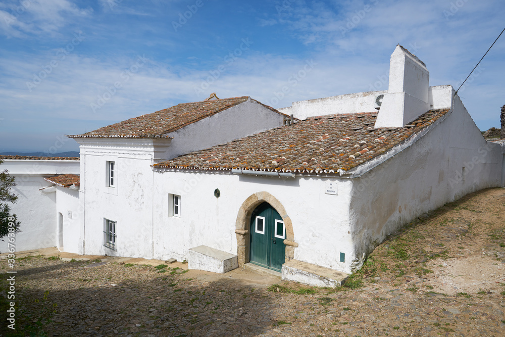 Evoramonte village street with white houses in Alentejo, Portugal