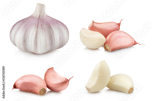 Collection of garlic and cloves, isolated on white background photo