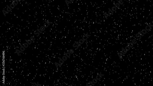 Snowfall, falling snow flakes. Normal speed animated video in isolated black background.