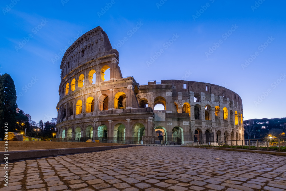 View of Coliseum at sunset. Roma, Italy 
