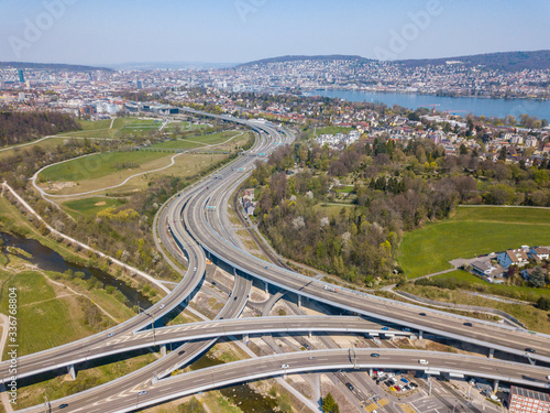 Aerial view of highway in Switzerland leading to Zurich. Large intersection of motorway towards Zurich.
